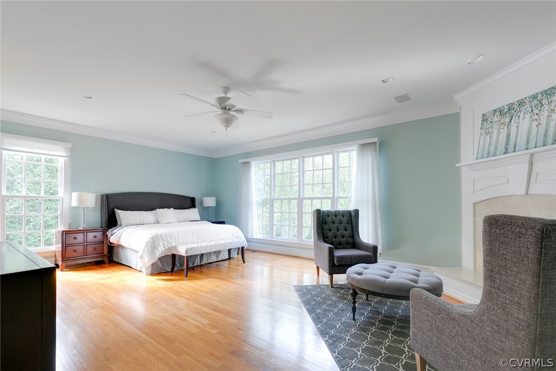 200 Kinloch Road Manakin-Sabot, VA 23103 - Photo 16 of 32 a spacious bedroom with a bed and wooden floor