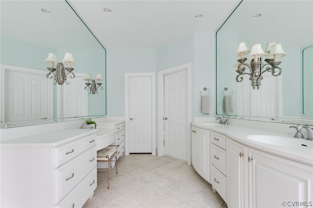 200 Kinloch Road Manakin-Sabot, VA 23103 - Photo 20 of 32 a spacious bathroom with a double vanity sink and a mirror