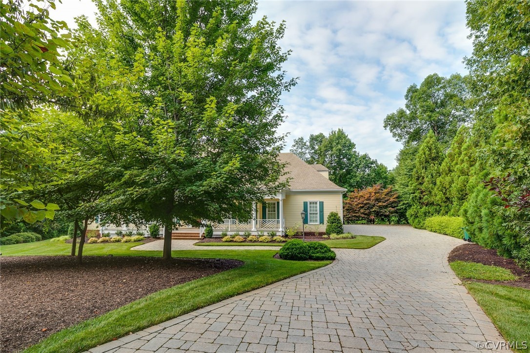 200 Kinloch Road Manakin-Sabot, VA 23103 - Photo 2 of 32 a front view of a house with a yard and trees