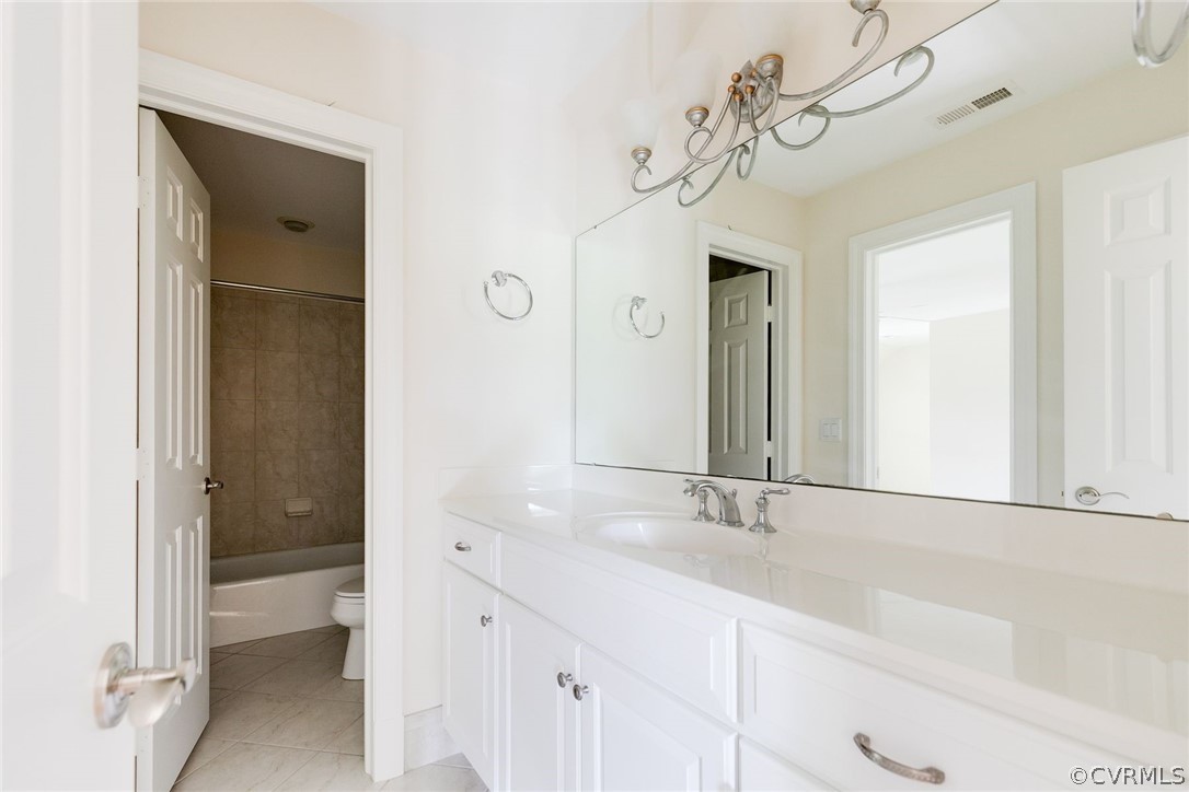 200 Kinloch Road Manakin-Sabot, VA 23103 - Photo 24 of 32 a bathroom with a granite countertop sink a mirror and a shower