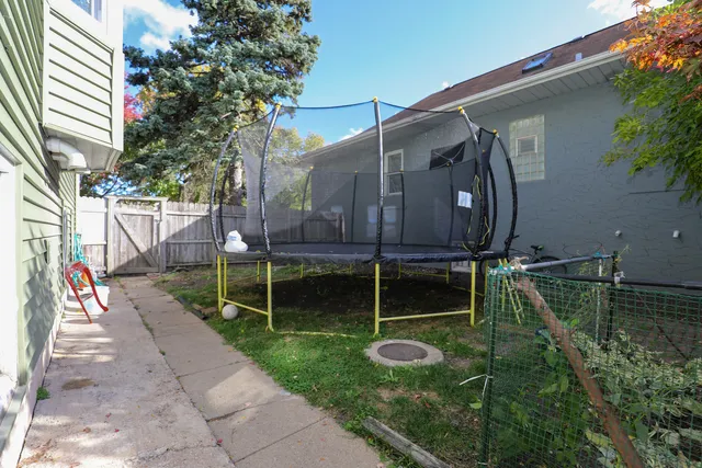 a backyard of a house with lots of green space