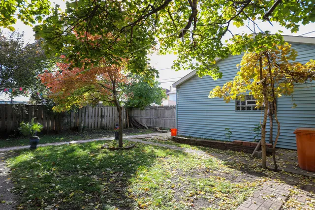 a backyard of a house with lots of green space