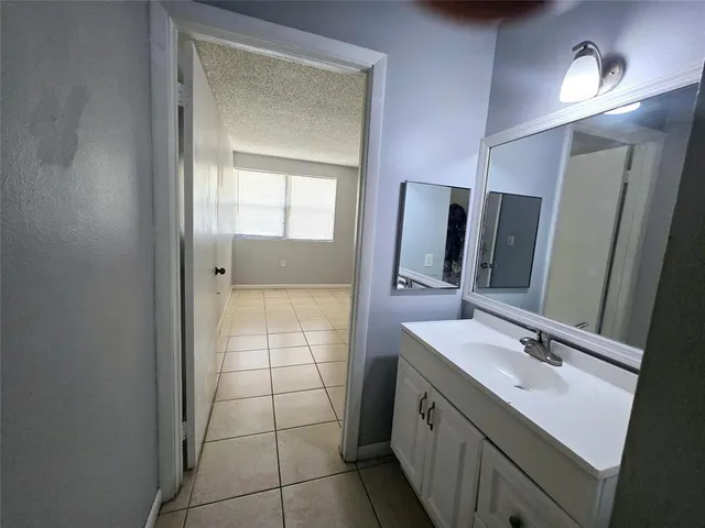 a bathroom with a toilet and a bathtub