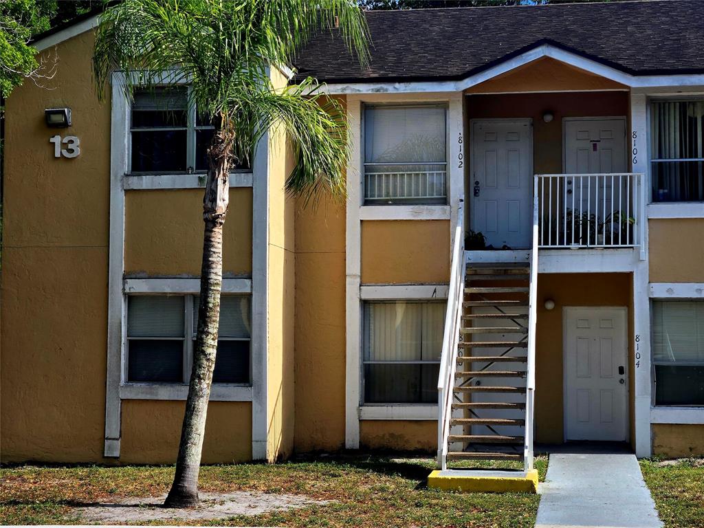 8100 Southwest 21st Court, Unit 8100 Miramar, FL 33025 - Photo 4 of 22 a front view of a house with parking area