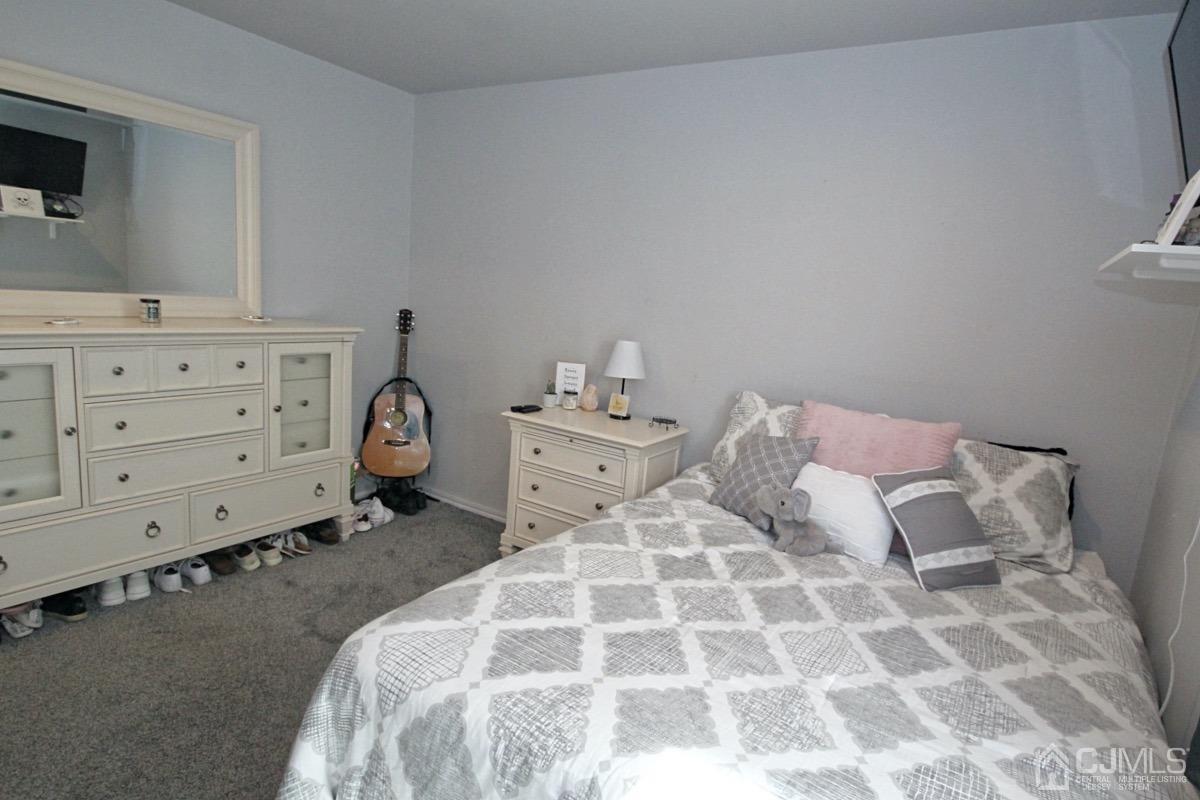 17 Higgins Road Old Bridge, NJ 08857 - Photo 21 of 30 a bedroom with a bed and a dresser