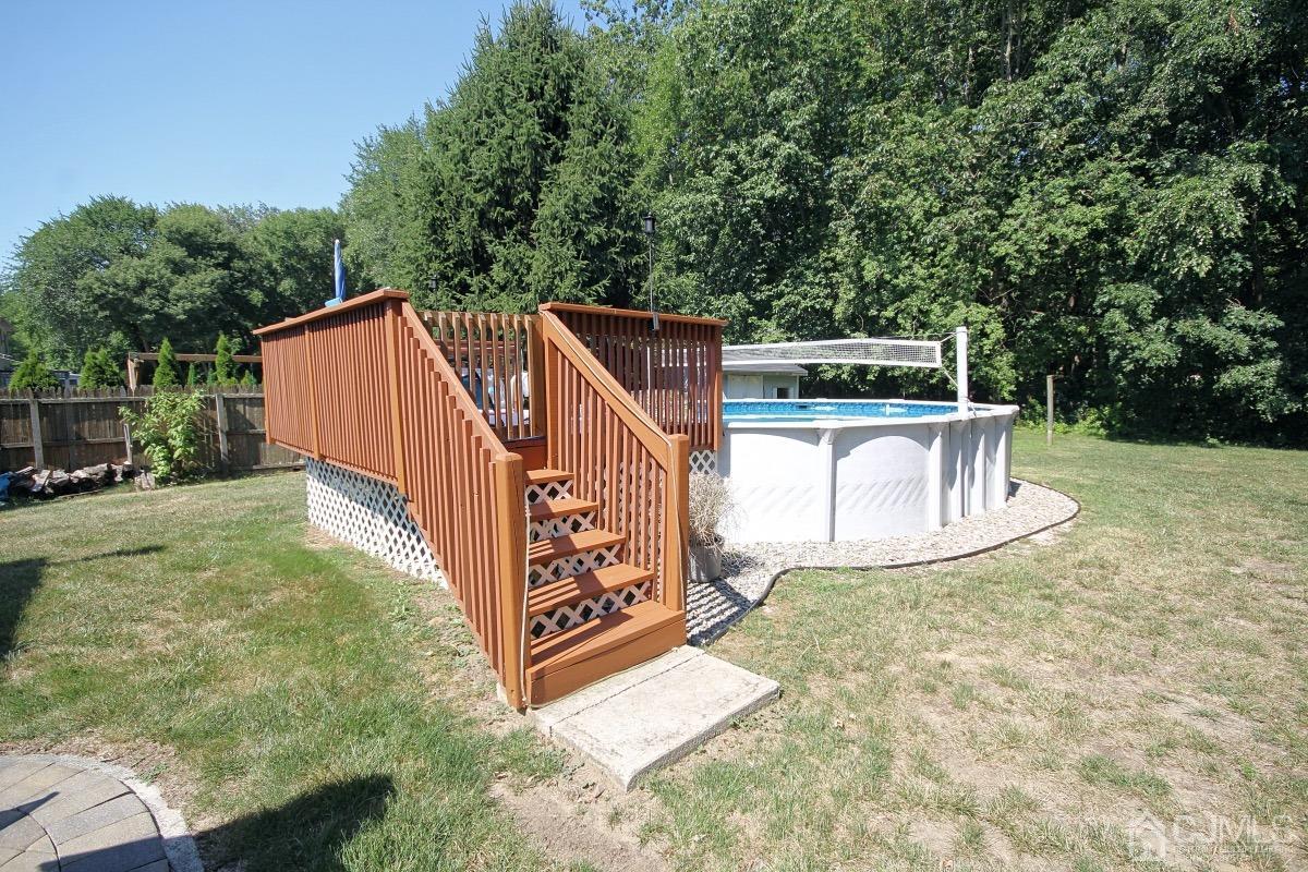 17 Higgins Road Old Bridge, NJ 08857 - Photo 28 of 30 a view of backyard with deck and trees