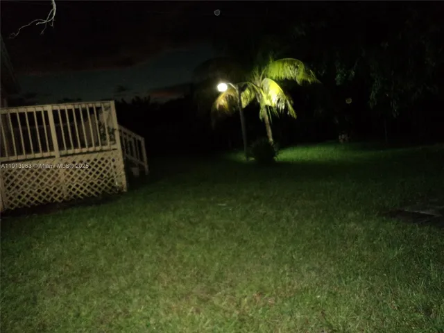 a view of a yard in front of house