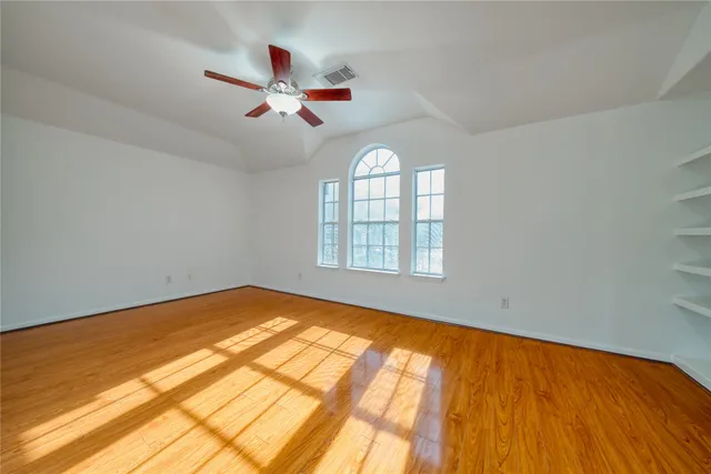 a view of an empty room and window
