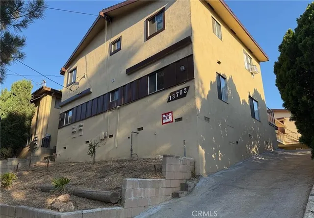 a front view of a building with multi story residential apartment building