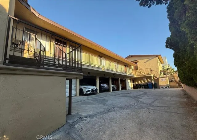 a view of a building with a street