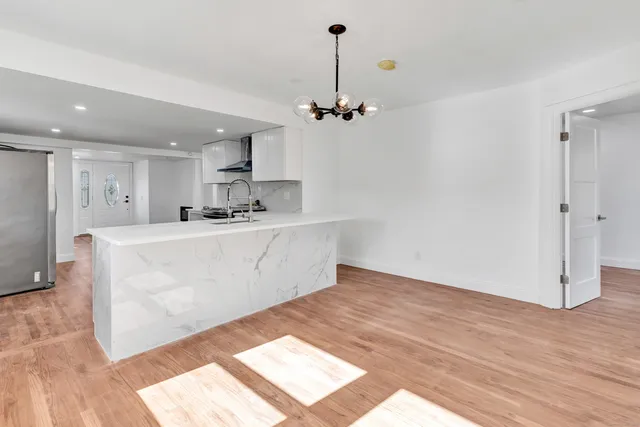 a view of a kitchen with marble kitchen and kitchen