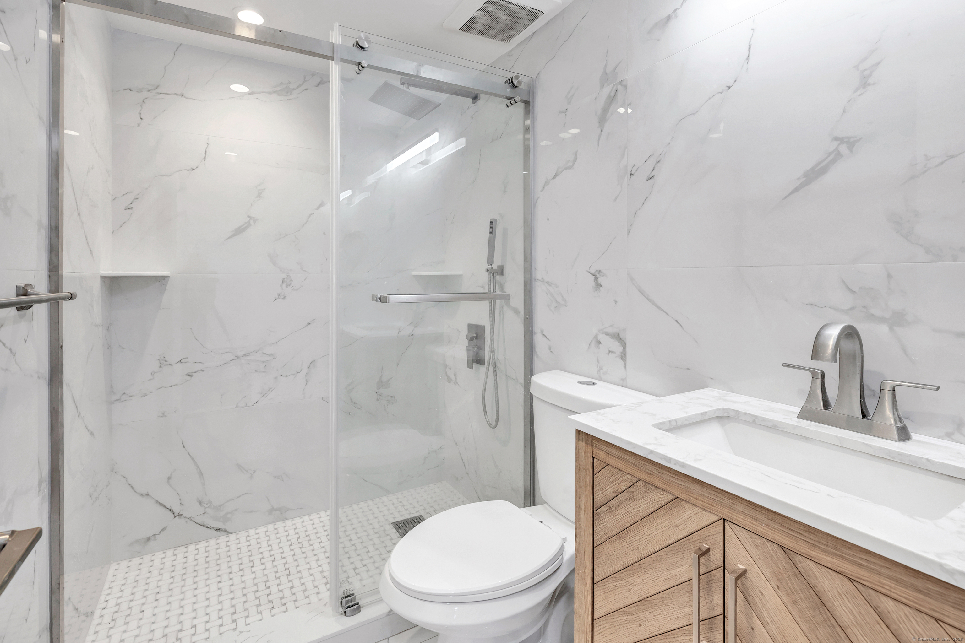 14 Fairview Avenue, Unit B Norwalk, CT 06850 - Photo 19 of 31 a bathroom with a sink a toilet and shower