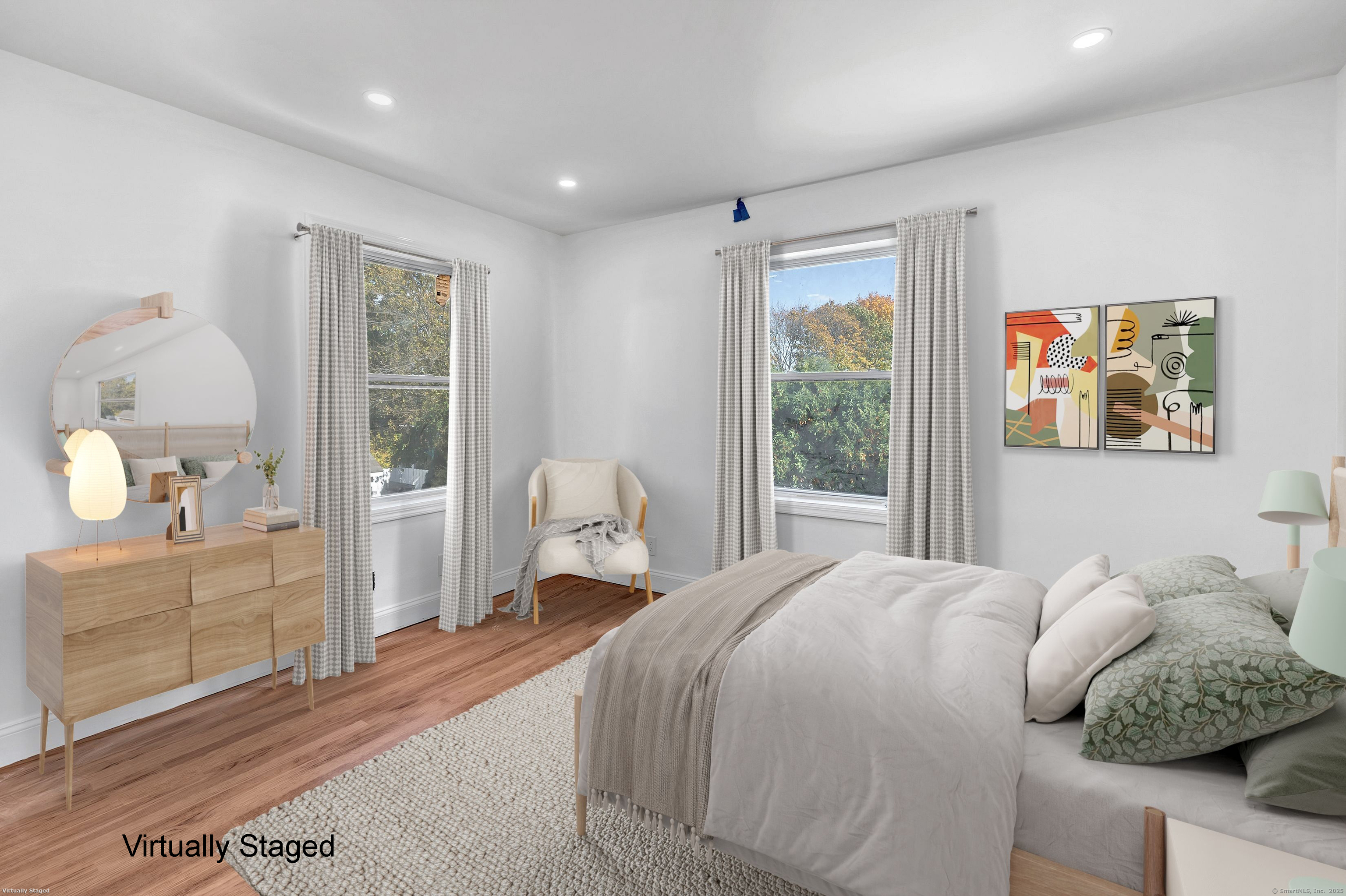 14 Fairview Avenue, Unit B Norwalk, CT 06850 - Photo 21 of 31 a bedroom with a large bed and a window