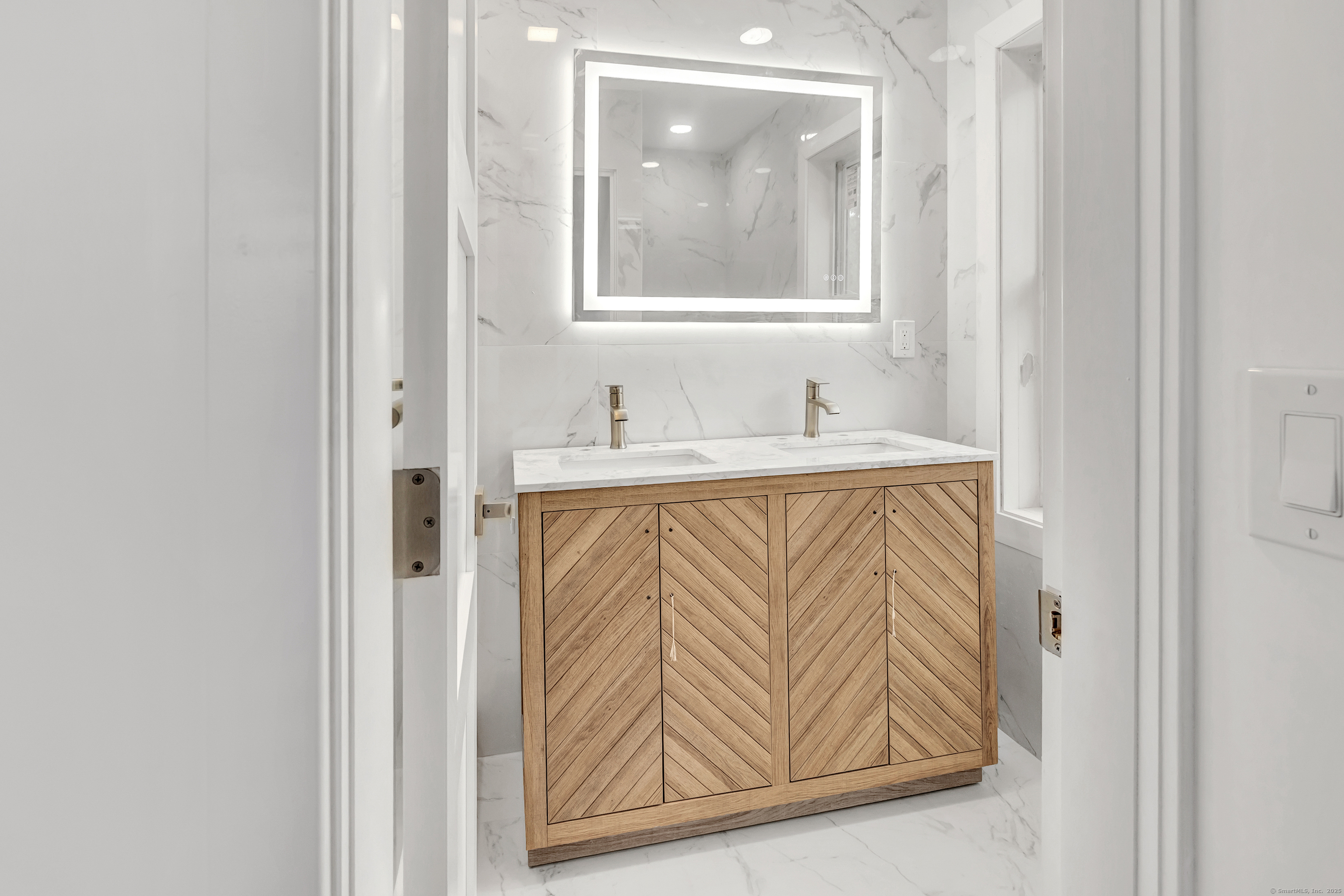 14 Fairview Avenue, Unit B Norwalk, CT 06850 - Photo 22 of 31 a bathroom with a sink and a mirror