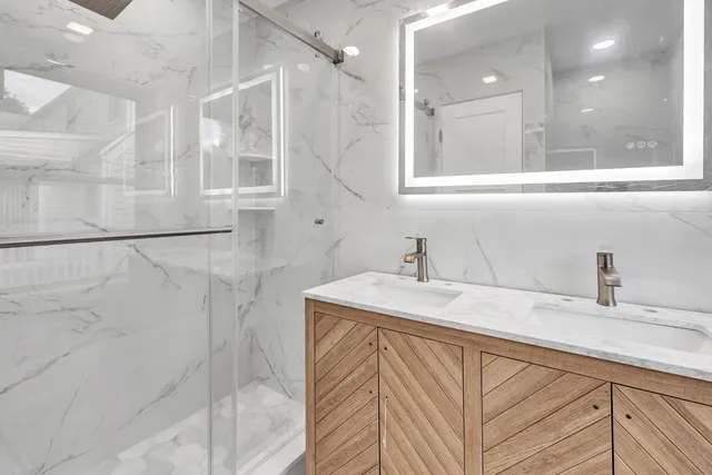 a bathroom with a sink and a mirror