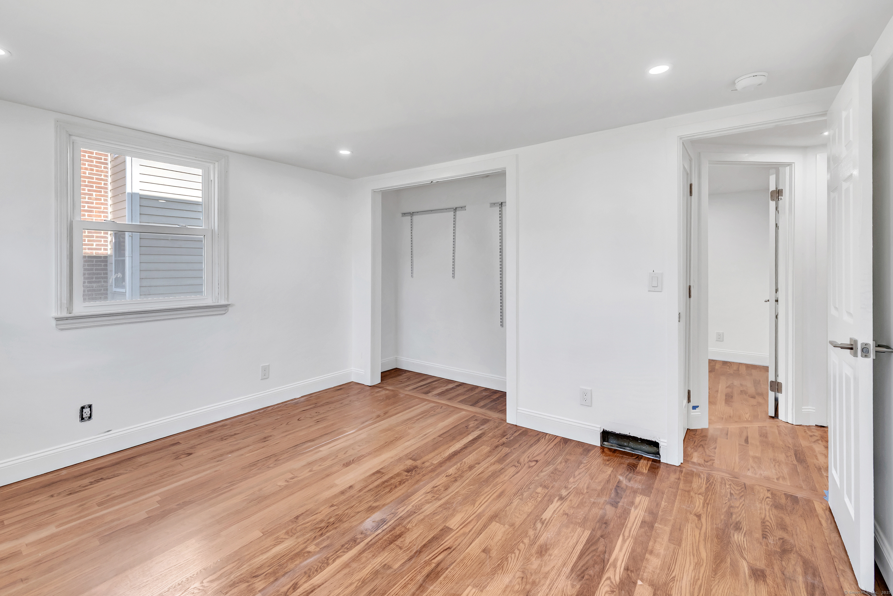 14 Fairview Avenue, Unit B Norwalk, CT 06850 - Photo 25 of 31 a view of empty room with wooden floor and fan