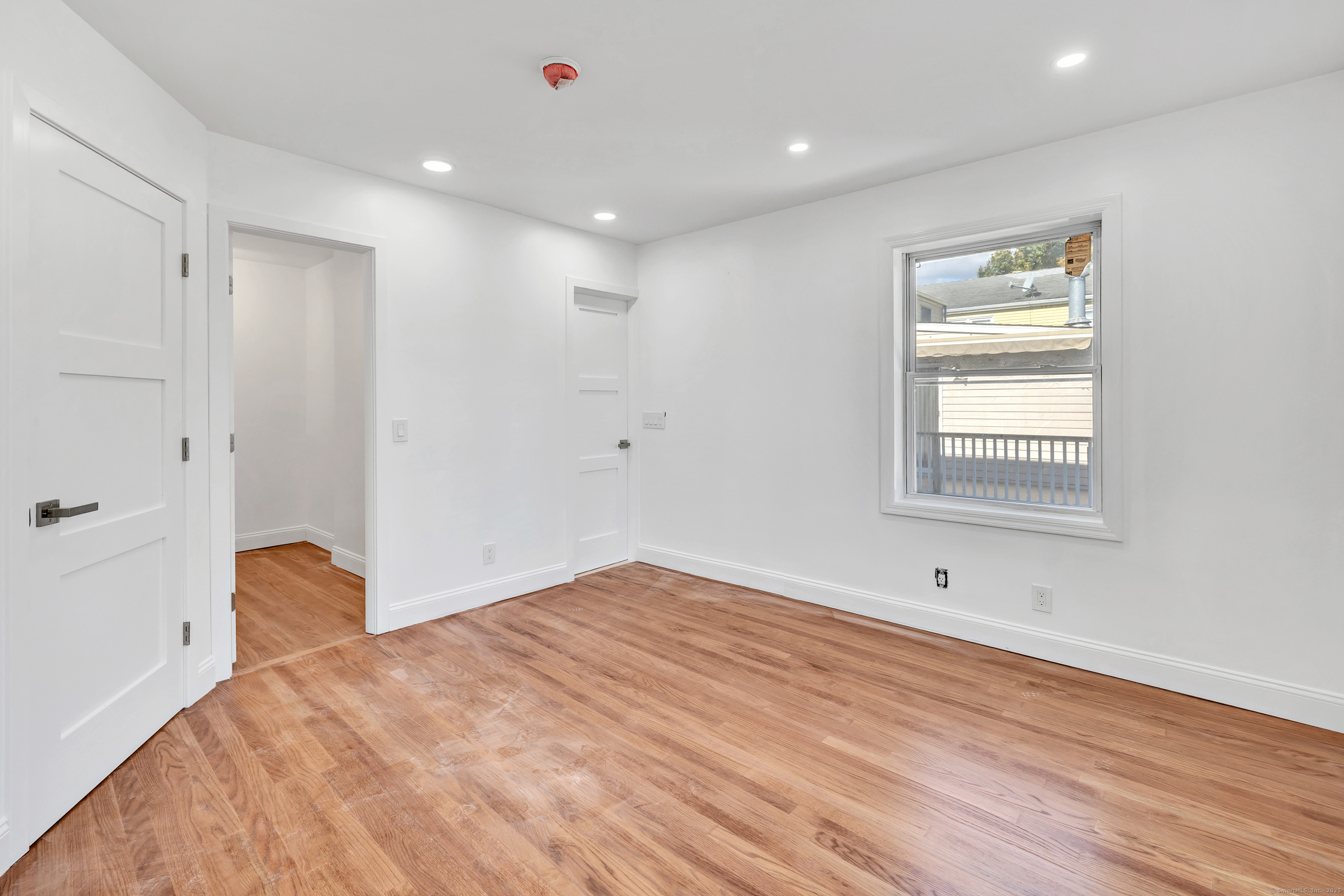 14 Fairview Avenue, Unit B Norwalk, CT 06850 - Photo 28 of 31 a view of empty room with wooden floor