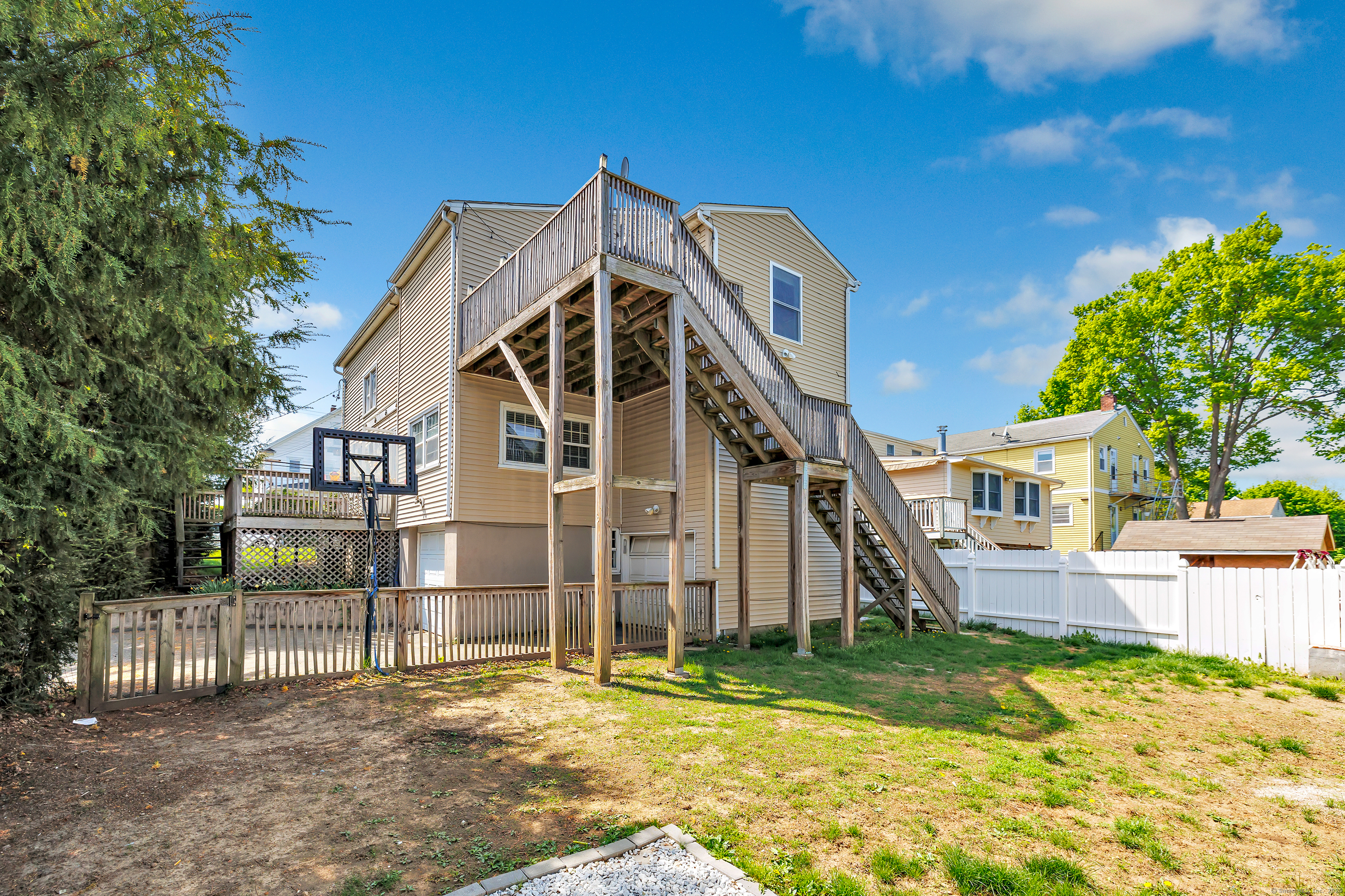 14 Fairview Avenue, Unit B Norwalk, CT 06850 - Photo 31 of 31 a view of a house with a yard