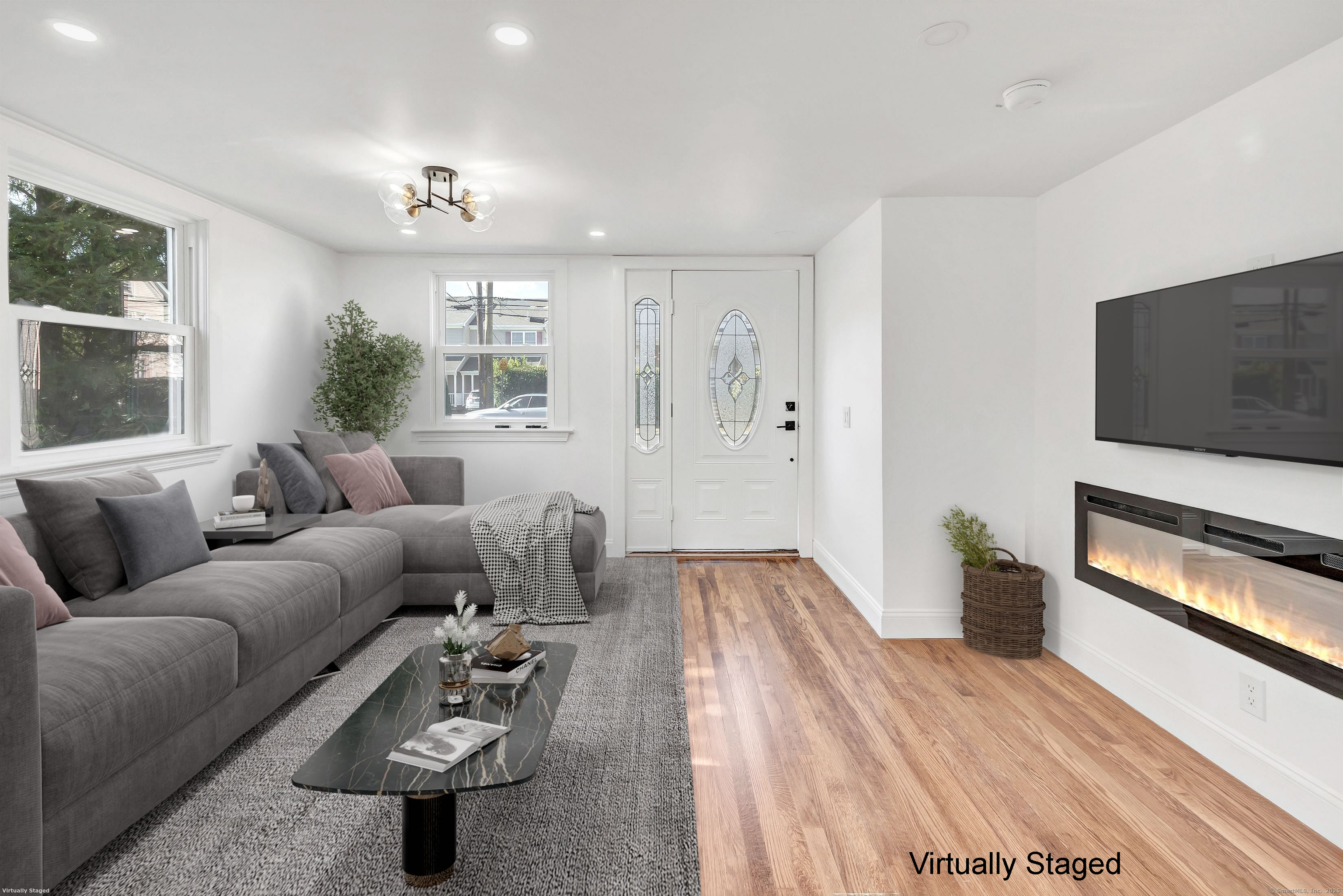 14 Fairview Avenue, Unit B Norwalk, CT 06850 - Photo 4 of 31 a living room with furniture and a flat screen tv