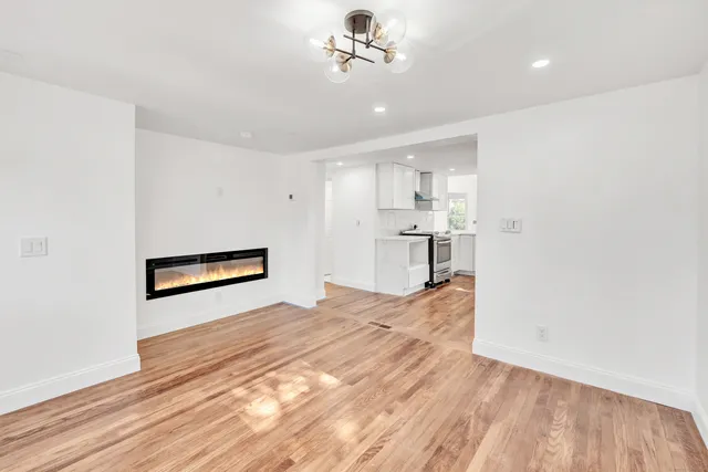 a view of a kitchen with a sink and dishwasher