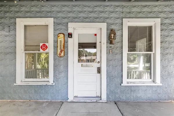 a front view of a house with an entrance