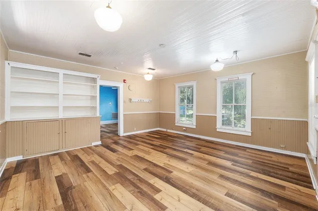 a view of a room with cabinet and a window