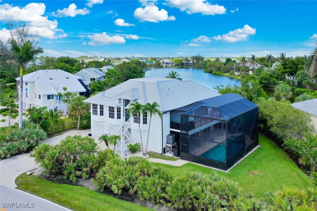1537 Sand Castle Road Sanibel, FL 33957 - Photo 1 of 50 an aerial view of a house