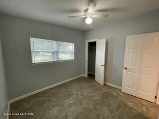 305 Prospect Avenue Cocoa, FL 32922 - Photo 16 of 25 an empty room with windows and fan