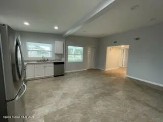 an empty room with windows