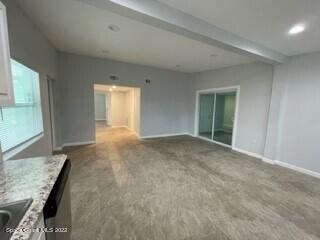 305 Prospect Avenue Cocoa, FL 32922 - Photo 21 of 25 a view of an empty room with a window