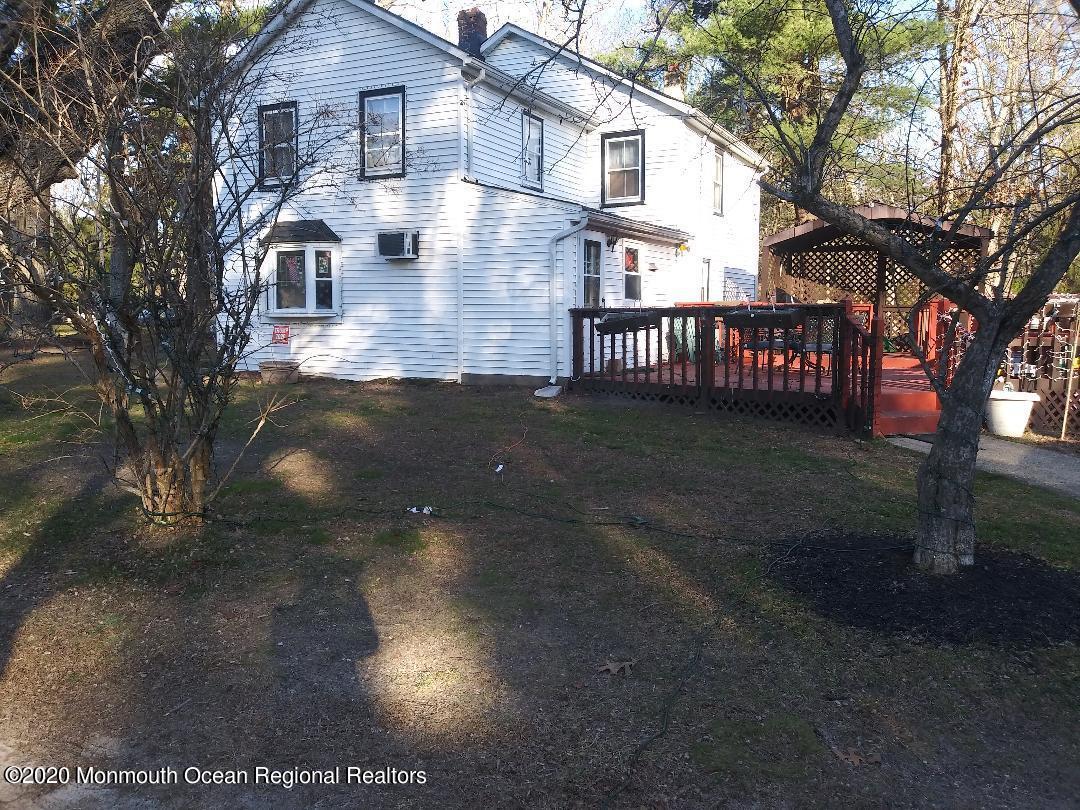 67 Paint Island Spring Road Clarksburg, NJ 08510 - Photo 2 of 8 a view of a yard in front of house