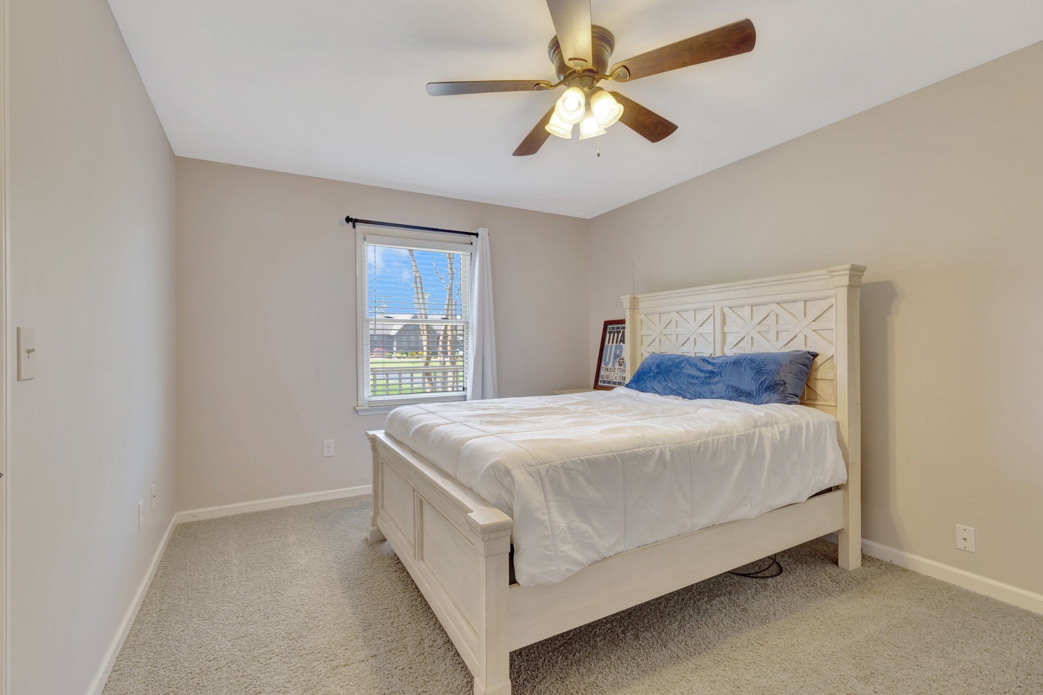 668 Bluff Drive Winchester, TN 37398 - Photo 14 of 55 a bed sitting in a bedroom next to a window