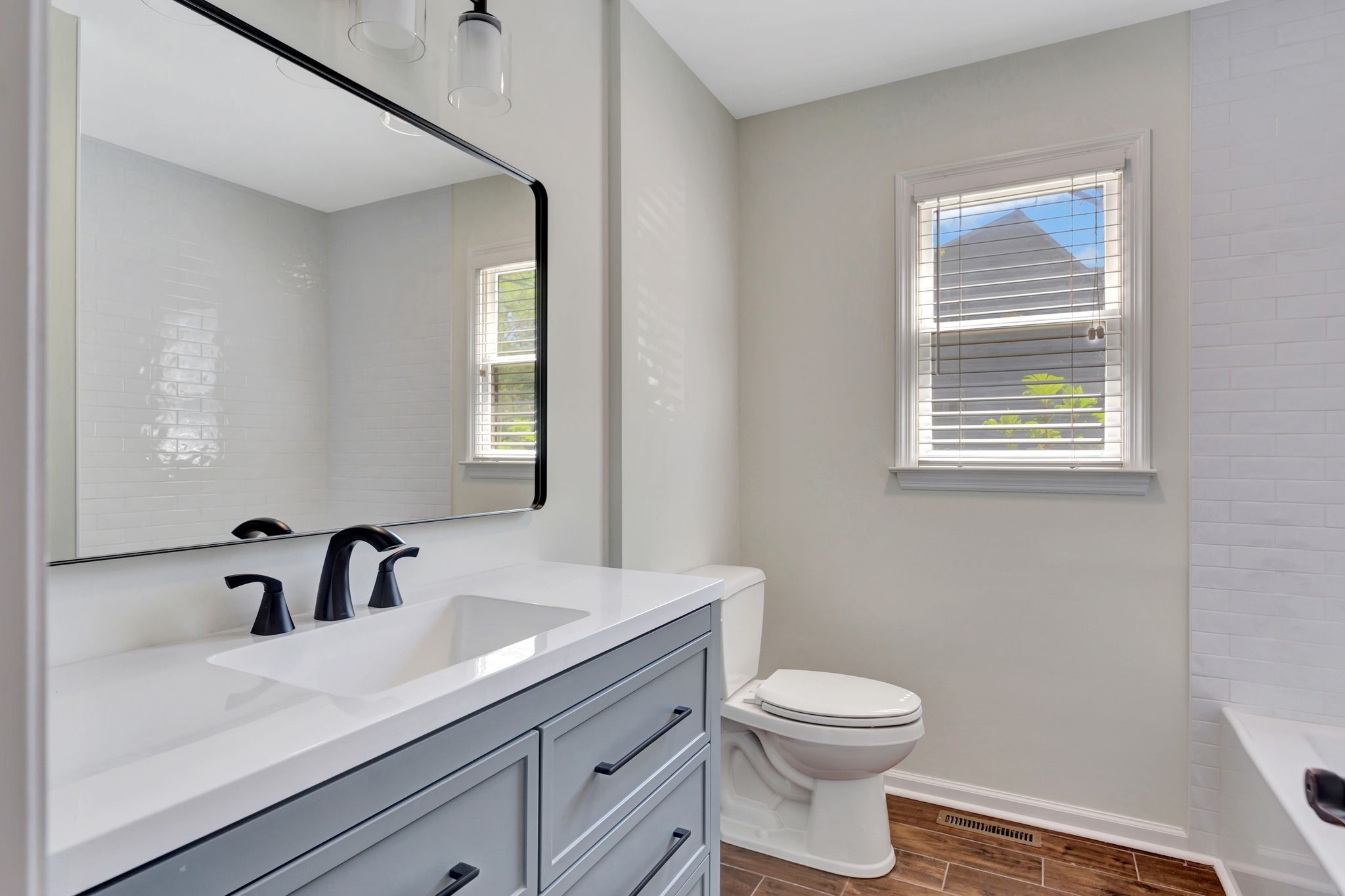 668 Bluff Drive Winchester, TN 37398 - Photo 17 of 55 a bathroom with a sink a toilet and a mirror