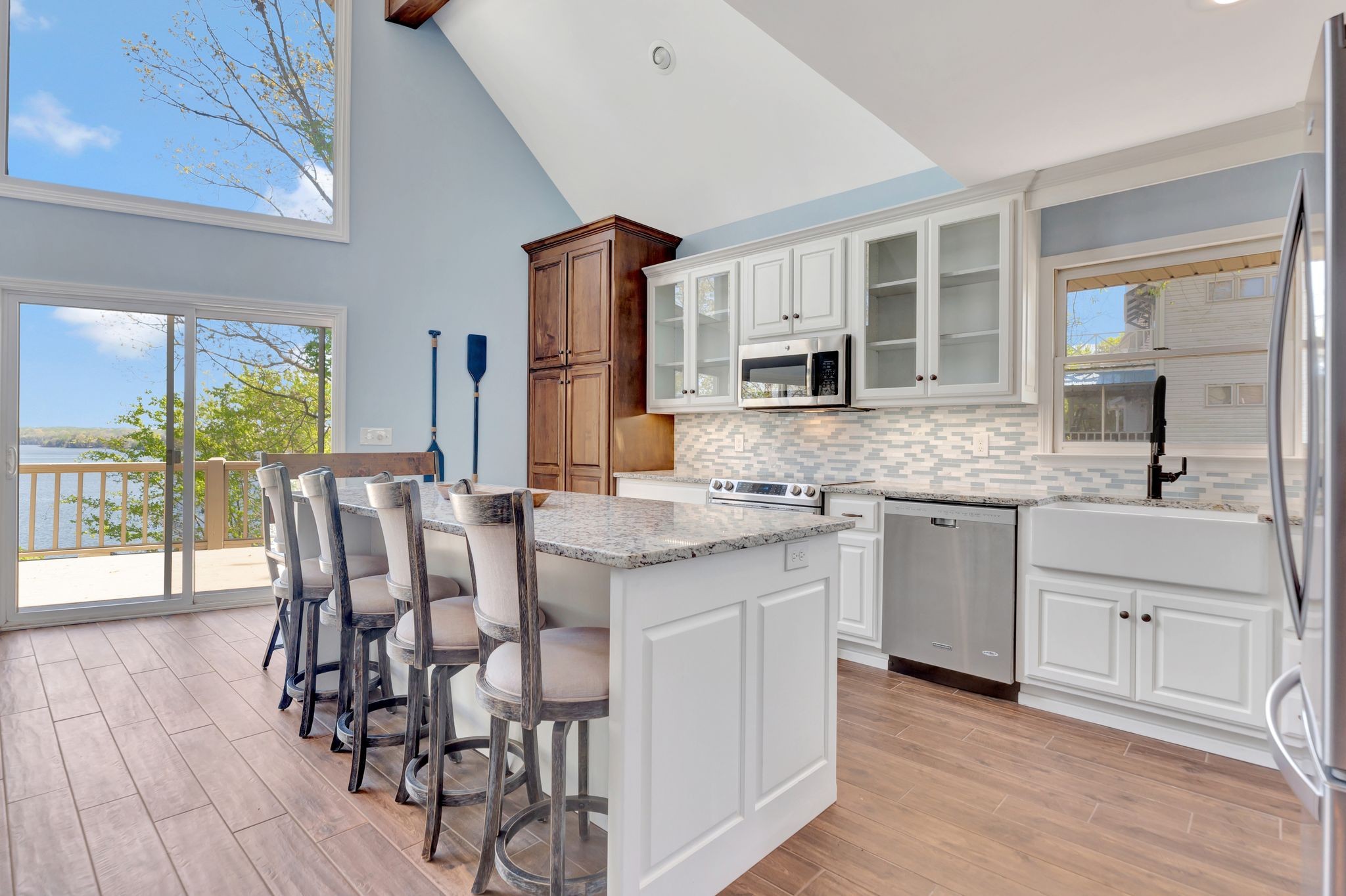 668 Bluff Drive Winchester, TN 37398 - Photo 26 of 55 a kitchen with stainless steel appliances granite countertop a kitchen island hardwood floor sink and stove
