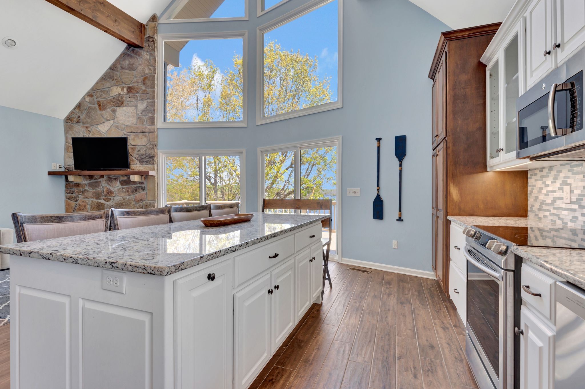 668 Bluff Drive Winchester, TN 37398 - Photo 29 of 55 a kitchen with stainless steel appliances granite countertop a stove and a sink