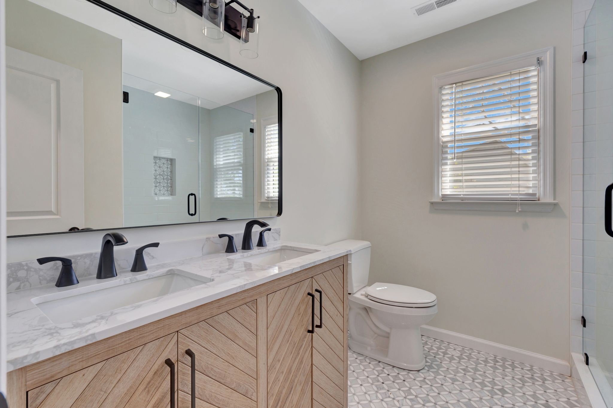 668 Bluff Drive Winchester, TN 37398 - Photo 36 of 55 a bathroom with a granite countertop sink a toilet and a mirror