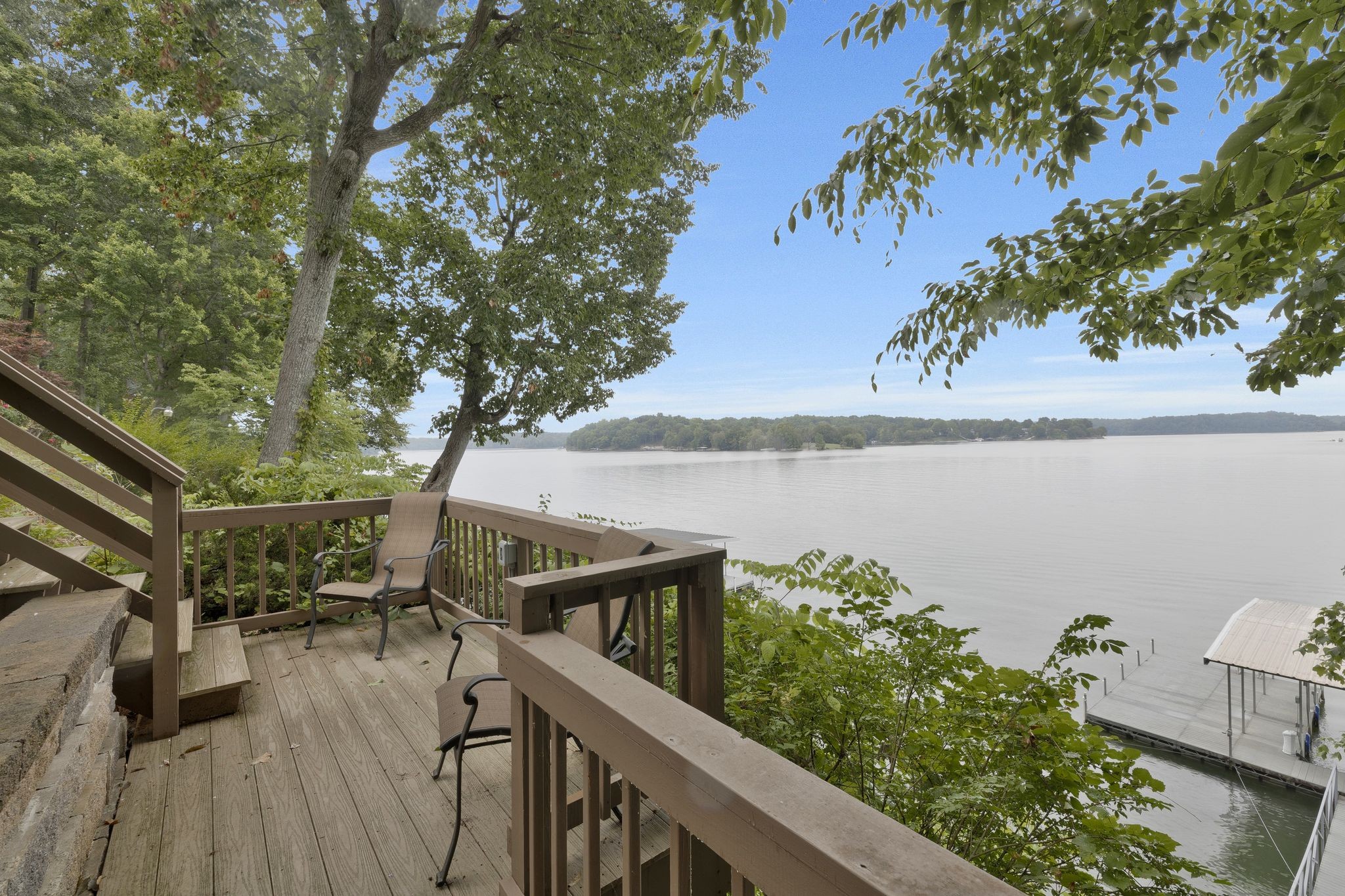 668 Bluff Drive Winchester, TN 37398 - Photo 4 of 55 a view of a balcony with wooden floor and lake view