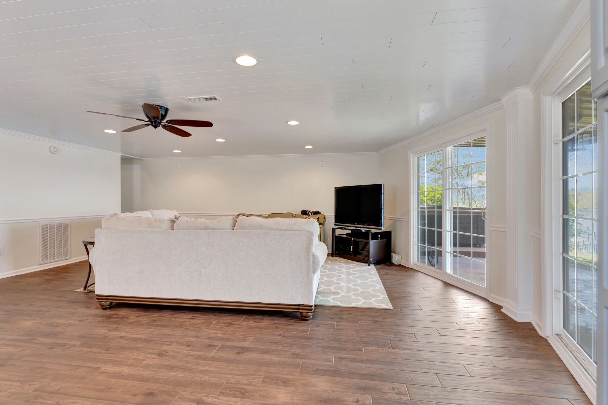 668 Bluff Drive Winchester, TN 37398 - Photo 46 of 55 a living room with furniture window and a flat screen tv