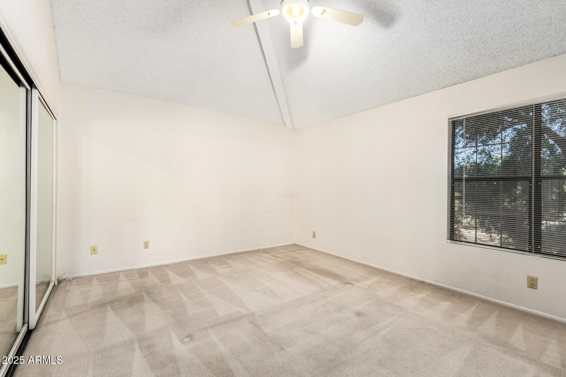 10019 East Mountain View Road, Unit 2114 Scottsdale, AZ 85258 - Photo 15 of 40 an empty room with a window