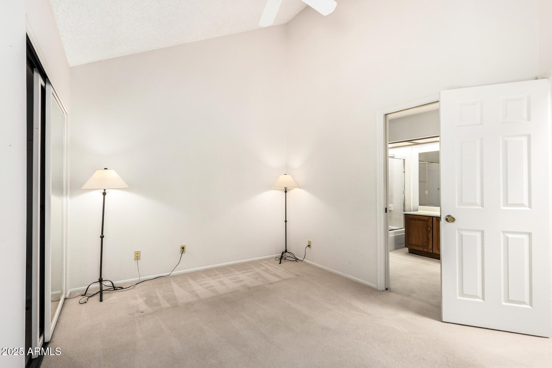 10019 East Mountain View Road, Unit 2114 Scottsdale, AZ 85258 - Photo 21 of 40 a view of a room with a ceiling fan and window