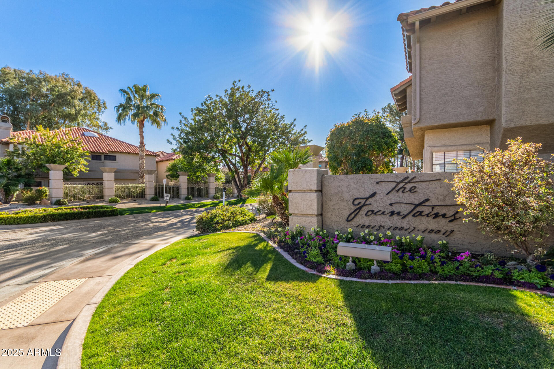10019 East Mountain View Road, Unit 2114 Scottsdale, AZ 85258 - Photo 28 of 40 a view of a house with a garden