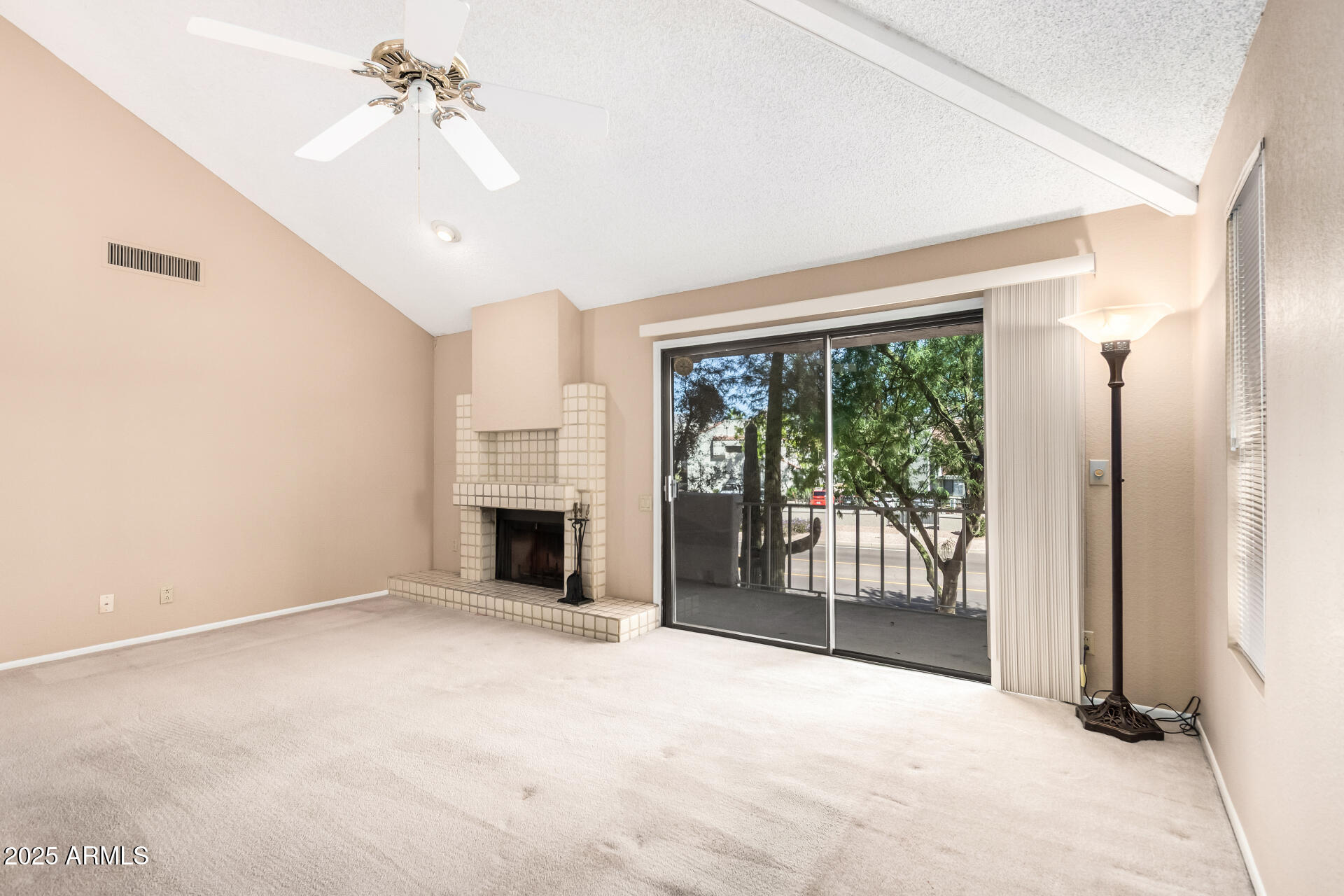 10019 East Mountain View Road, Unit 2114 Scottsdale, AZ 85258 - Photo 4 of 40 a view of empty room with fireplace