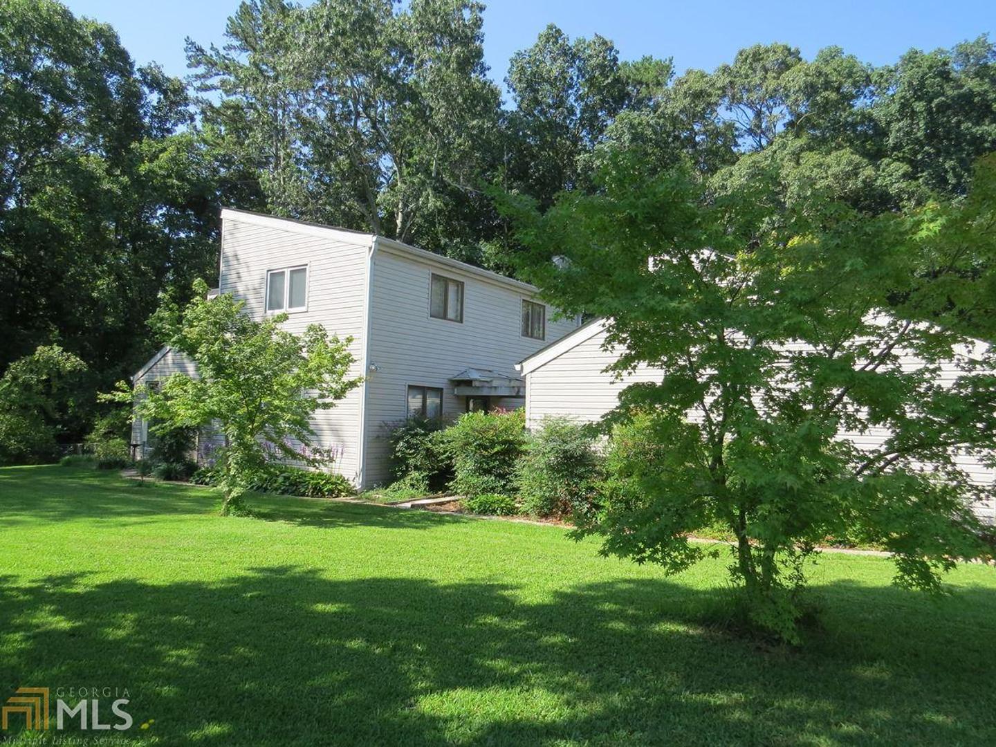 208 Defore Road, Unit 28 Toccoa, GA 30577 - Photo 1 of 1 a view of a house with a yard