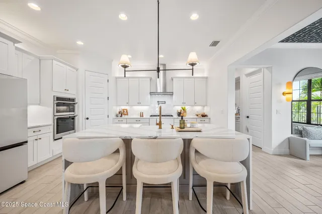 a store room with lots of clutter and shelves