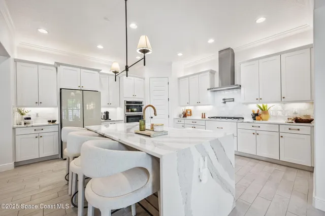 a view of a dining room with furniture and window
