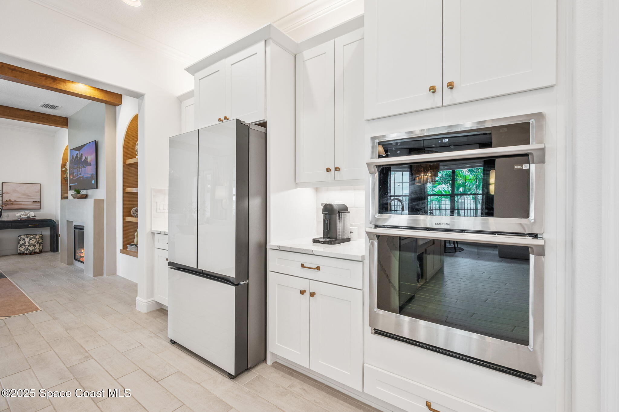 2444 Addison Drive Melbourne, FL 32940 - Photo 19 of 93 a kitchen with stainless steel appliances a stove and a refrigerator