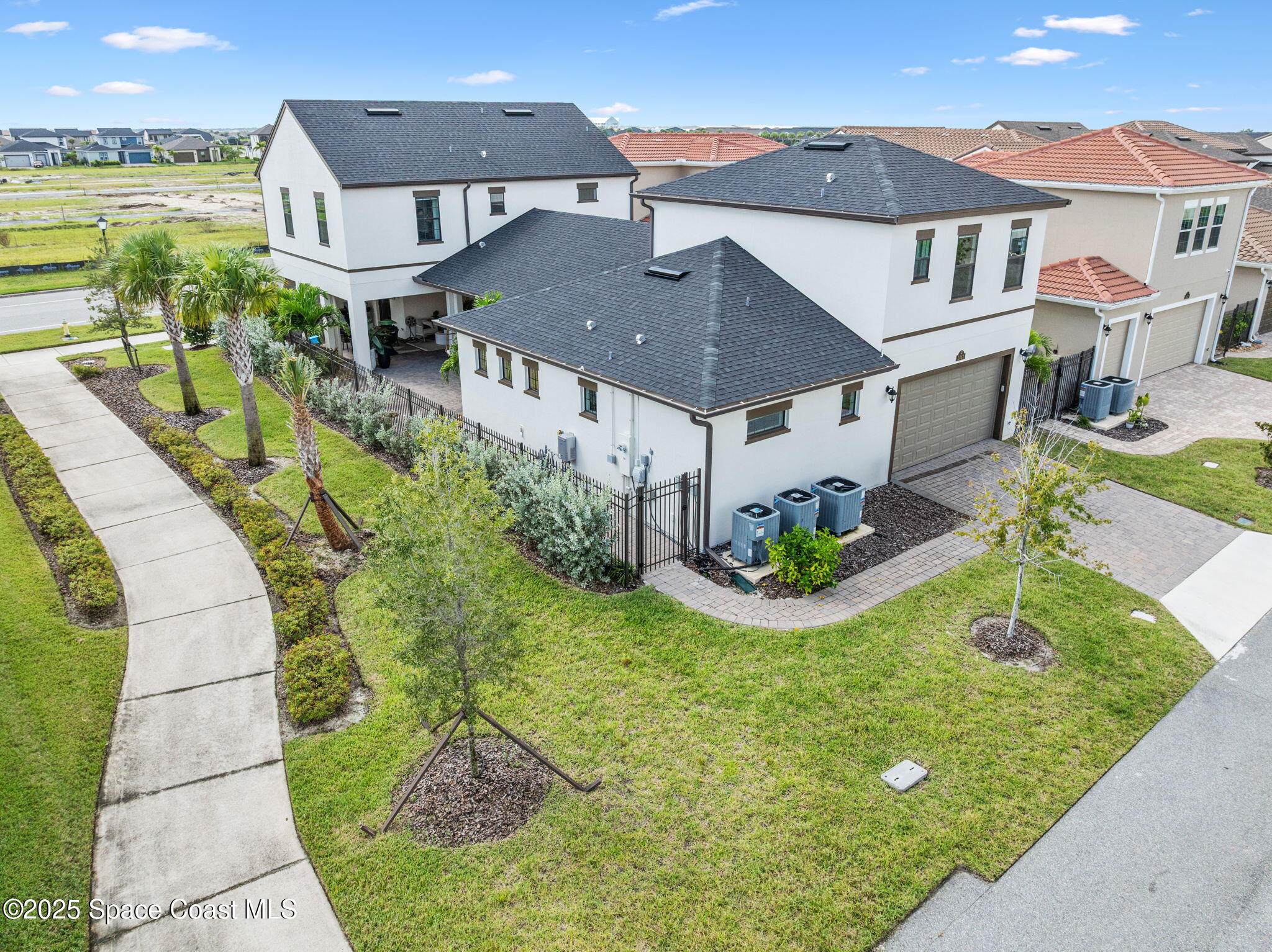 2444 Addison Drive Melbourne, FL 32940 - Photo 2 of 93 an aerial view of a house