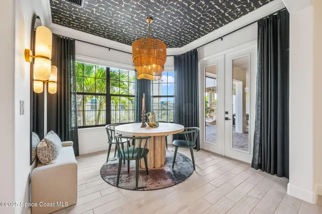 a bathroom with a granite countertop toilet sink and mirror