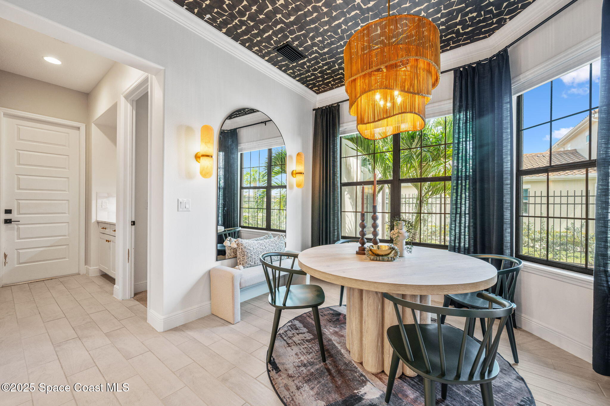 2444 Addison Drive Melbourne, FL 32940 - Photo 24 of 93 a view of a dining room with furniture and window