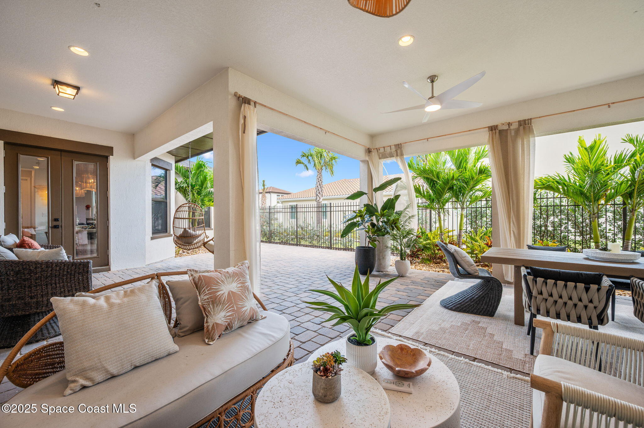 2444 Addison Drive Melbourne, FL 32940 - Photo 50 of 93 a living room with furniture and a potted plant